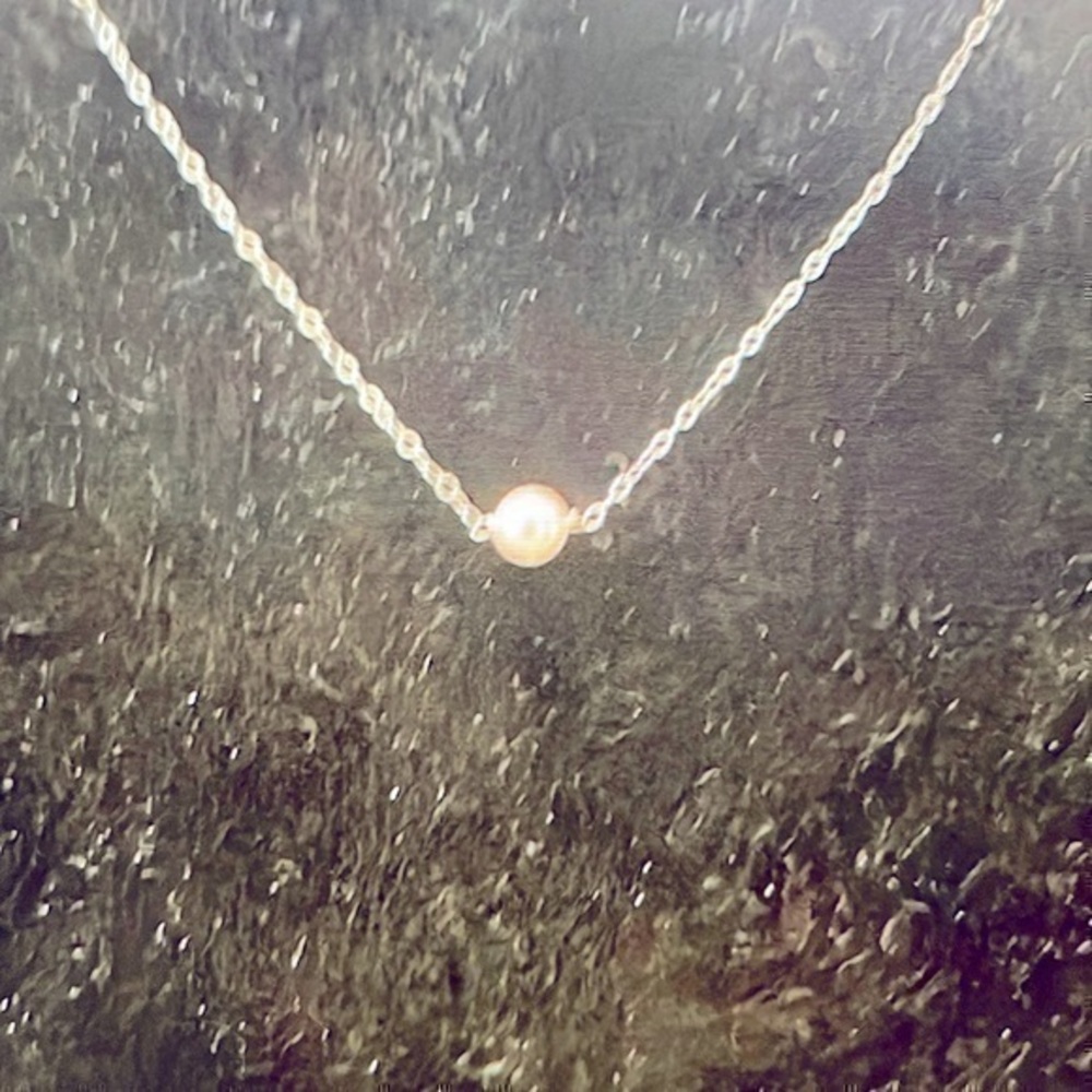 14k gold and single Pearl necklace. 40g